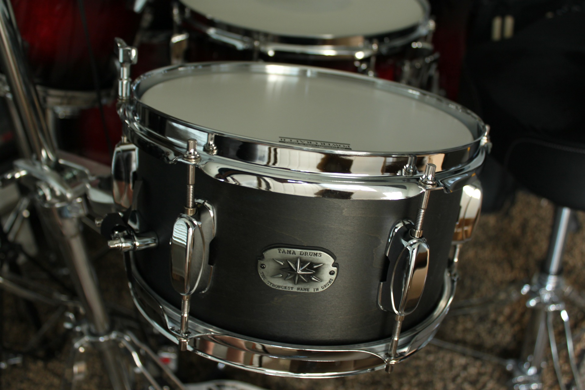 Close up of silver colored drums for sn article about drum lessons in Tampa