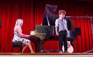 student performing after music lessons in Tampa for kids